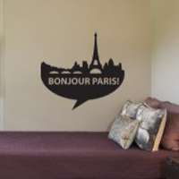 Αυτοκόλλητο τοίχου από βινύλιο που απεικονίζει σιλουέτες από τα κτίρια του Παρισιού και τον πύργο του Eiffel, με το λεκτικό 