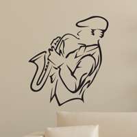 Αυτοκόλλητο τοίχου από βινύλιο που απεικονίζει έναν μουσικό σε περιγράμματα που παίζει σαξόφωνο. Είναι ανθεκτικό και κολλάει και ξεκολλάει εύκολα.Μπορείτε να μας ζητήσετε να εκτυπωθεί σε ότι διάσταση και χρώμα θέλετε. 