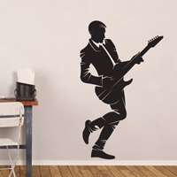 Αυτοκόλλητο τοίχου από βινύλιο που απεικονίζει έναν άντρα  που ηλεκτρική κιθάρα. Είναι ανθεκτικό και κολλάει και ξεκολλάει εύκολα.Μπορείτε να μας ζητήσετε να εκτυπωθεί σε ότι διάσταση και χρώμα θέλετε.  